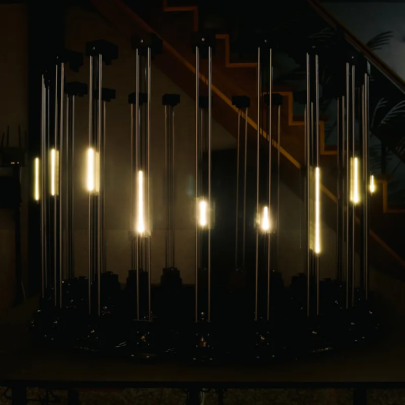 Warm light tubes suspended in an exhibition space