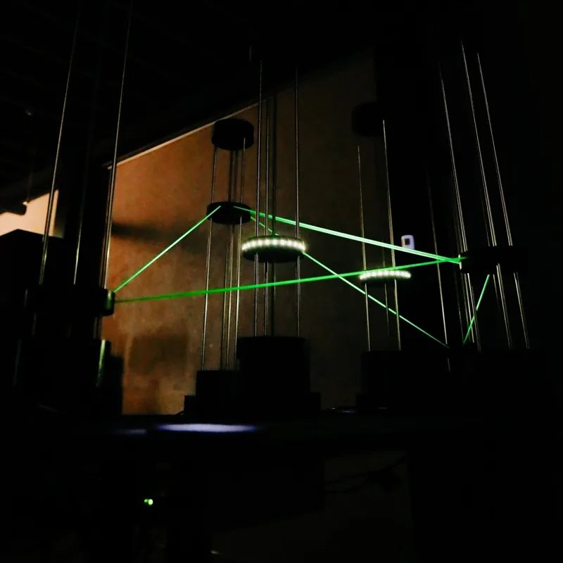 Green light passing through suspended installations