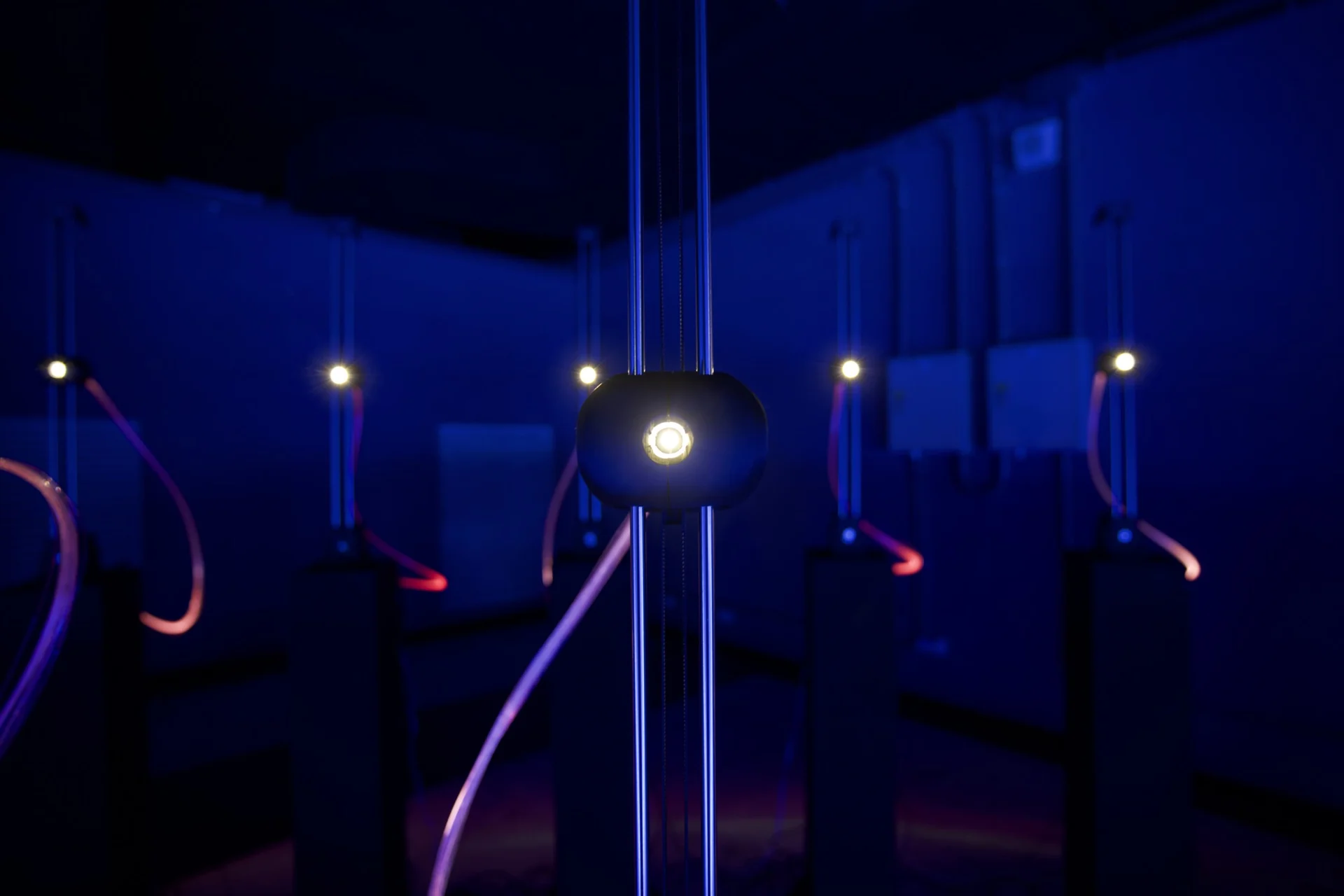 Installation space illuminated in deep blue